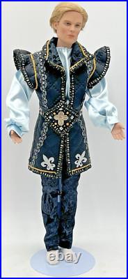 2003 Tonner Male 17 Doll Blonde Hair In Black, Gold, Blue Unmarked Outfit