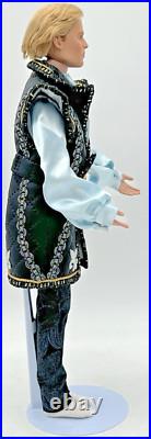 2003 Tonner Male 17 Doll Blonde Hair In Black, Gold, Blue Unmarked Outfit