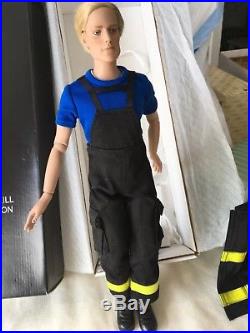TONNER MATT 17 Vinyl DOLL Dressed in the Hero Fireman outfit with Helmet & Stand