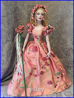 Tonner Doll wearing Wizard of Oz Glinda's Poppy Promenade outfit